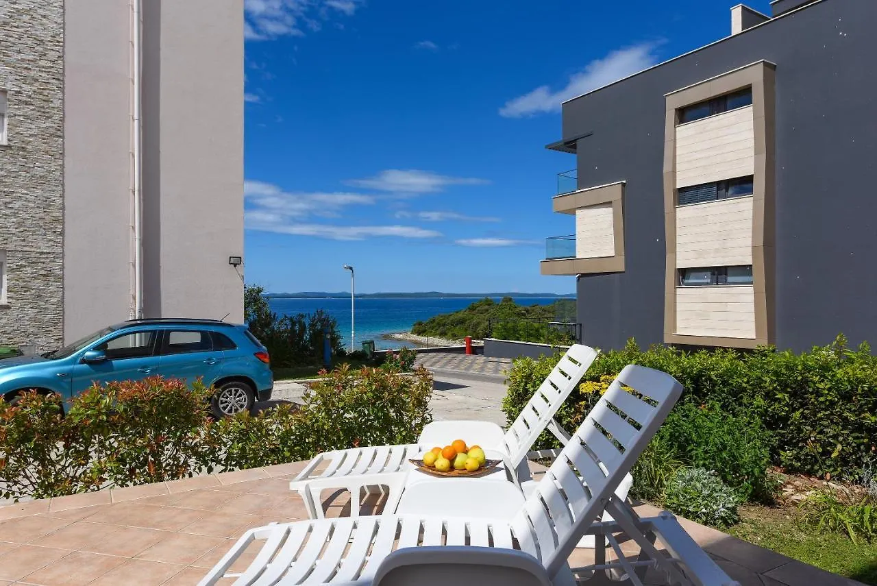 Sunset Beach Suites Kozino Apartment